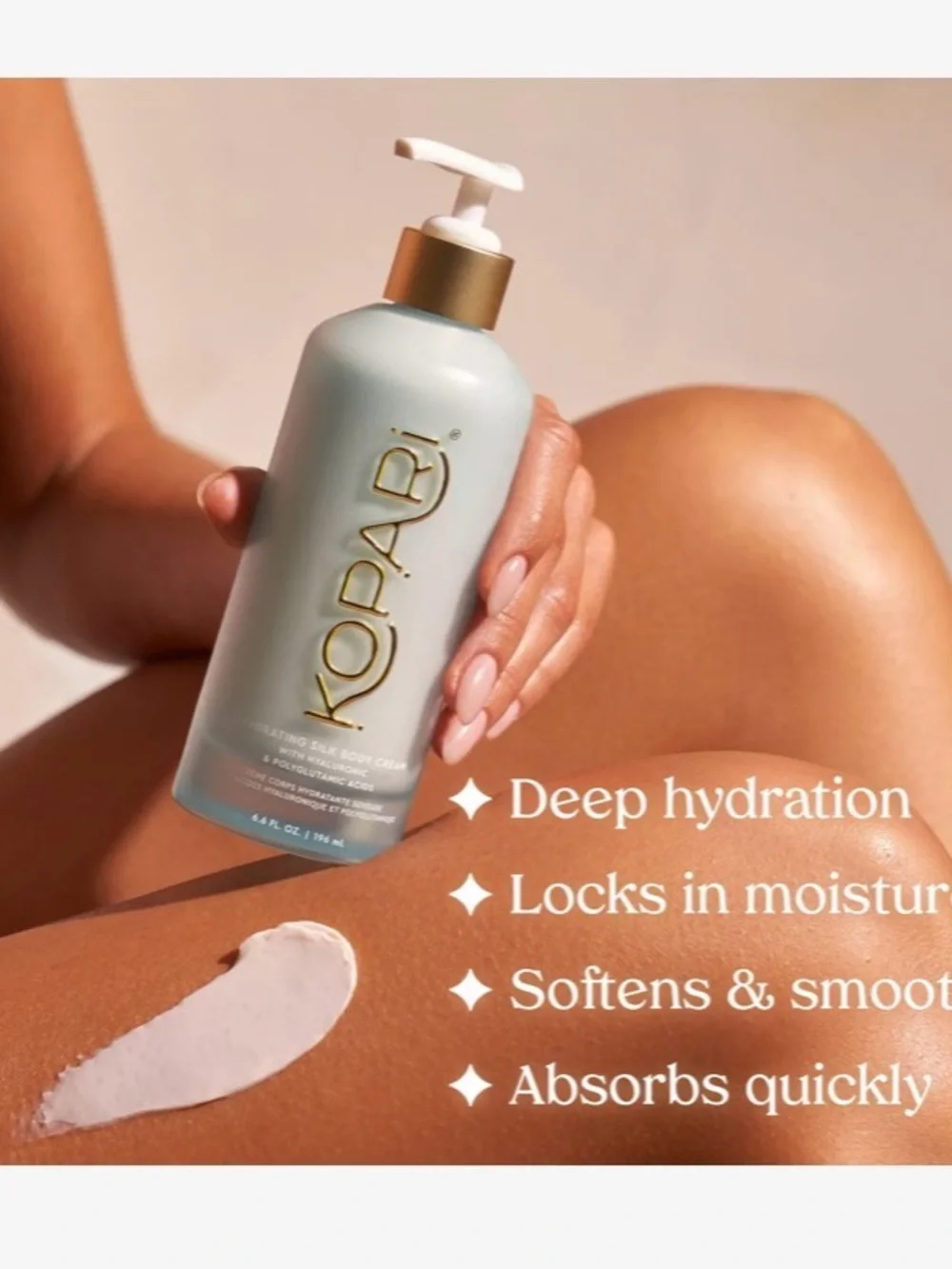 Kopari Hydrating Silk Body Cream — Aqua Bottle with Gold Accents